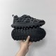 Dior B31 Runner Black Mesh Trainer Outsole Detail Hand holding Dior B31 Runner Black Mesh Trainer showcasing the textured lug outsole.