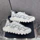 Dior B31 Runner Low Top Trainers In White Grey Profile Side profile pair of Dior B31 Runner Low Top Trainers in white grey resting on box