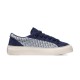 Dior B33 navy blue oblique jacquard low top trainer lateral side view studio shot