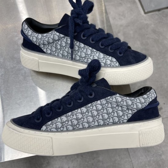 Dior B33 trainers in navy blue oblique pattern displayed together from the side