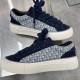 Dior B33 trainers in navy blue oblique pattern displayed together from the side