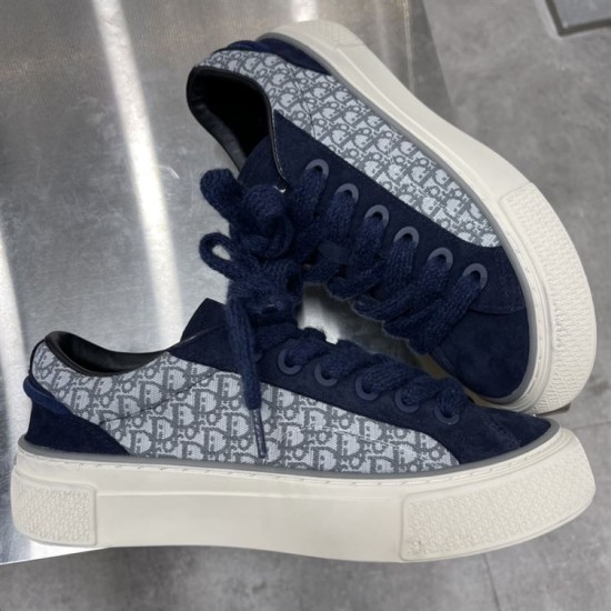 Dior B33 navy blue jacquard low top trainers placed diagonally