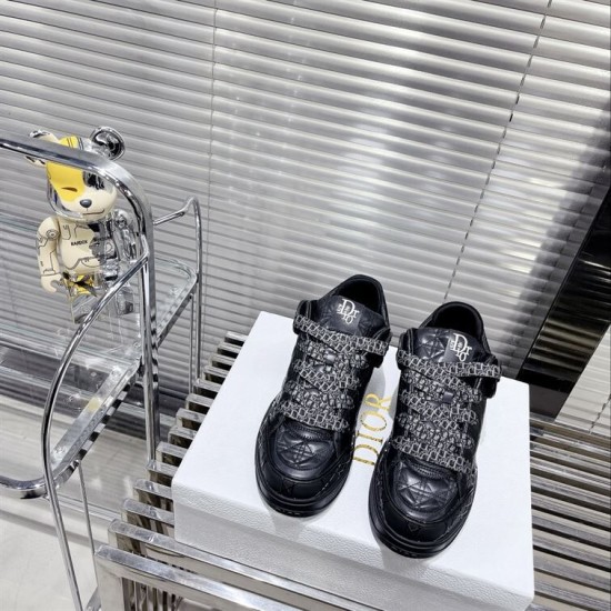 Dior B9S Black Quilted Leather Trainers Front View Front high-angle view of black Dior B9S quilted leather trainers with monogrammed laces.