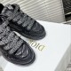 Dior B9S Black Quilted Leather Trainers Toe Detail Close-up of toe box and wide patterned laces on black Dior B9S trainers.