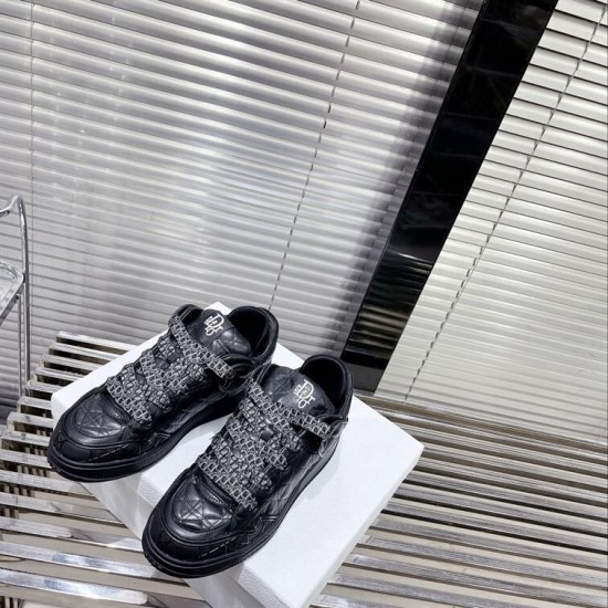 Dior B9S Black Quilted Leather Trainers Overhead View Overhead front view of pair of black Dior B9S trainers showcasing wide patterned laces.
