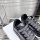 Dior B9S Black Quilted Leather Trainers Tongue Detail Close-up showing padded tongue label and wide laces on black Dior B9S low top trainers.