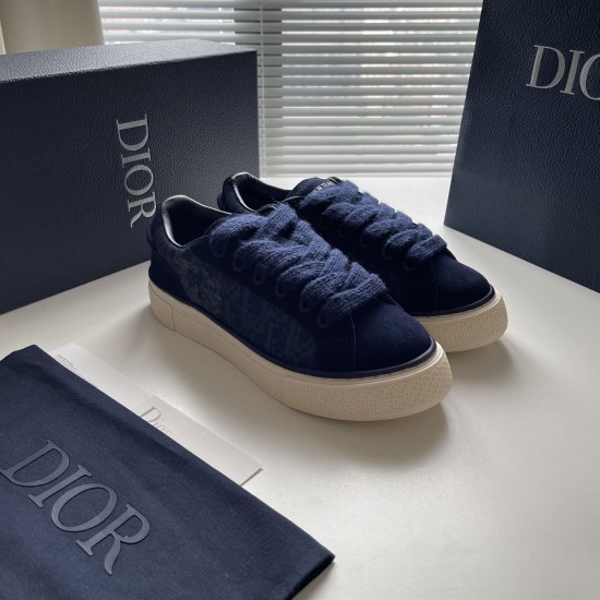 Dior Tears B33 Navy Blue Trainers Angled Front in navy blue and cream Angled front perspective of navy blue Dior Tears B33 trainers with thick navy laces in navy blue and cream