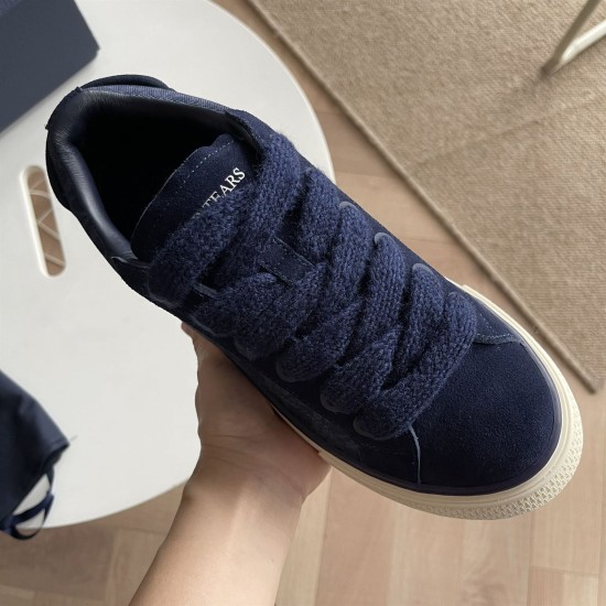 Dior Tears B33 Navy Blue Trainer Laces Close-Up in navy blue and cream Close-up hand view of Dior Tears B33 trainer front showing thick navy laces and suede toe box in navy blue and cream