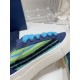 Dior B33 Blue Trainer Fabric Detail Close-up of the multicolour striped fuzzy panel and suede eyelet stay on Dior B33 trainer in blue