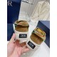 Dior B33 Heel Patch View in brown and yellow Rear view showing Dior 30 Avenue Montaigne heel patches on brown suede trainers in brown and yellow