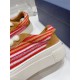 Dior B33 Striped Canvas Detail in brown and red Close-up of red and brown striped canvas panel on the Dior B33 Low Top Trainer