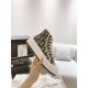Dior Walk'n'dior High-Top Platform Trainers Side Detail in blue and beige Close-up side view of the blue Oblique motif canvas and platform sole on Dior trainers in blue and beige