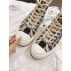 Dior Walk'n'dior High-Top Platform Trainers Lacing Detail in blue and beige Detail view of cream laces and Christian Dior logo strap on blue Oblique high-top trainers in blue and beige