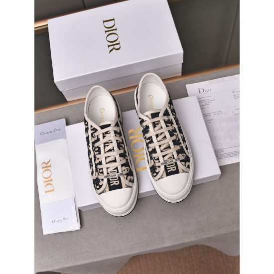 Top-down view of navy blue Dior oblique platform trainers showing laces and insoles
