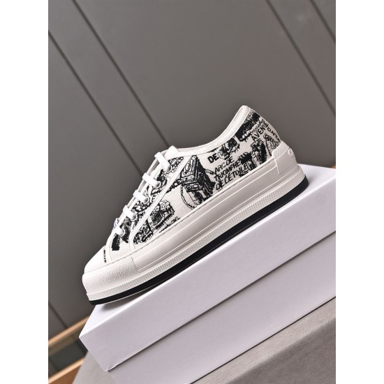 Lateral side view of Dior Walk'n'dior platform trainer resting on a white display box in white and black