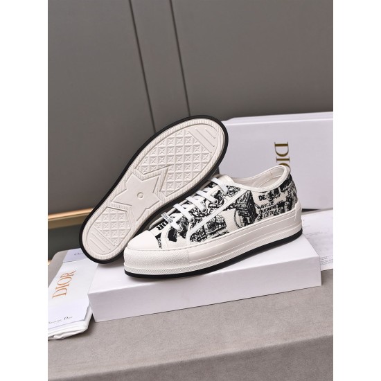Dior Walk'n'dior platform trainer displayed alongside its star-patterned rubber sole in white and black