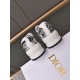 Rear view of Dior Walk'n'dior platform trainers showcasing the embossed heel branding in white and black