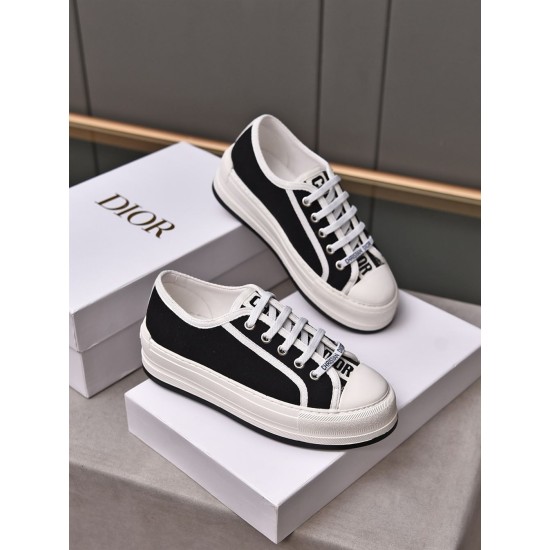 Dior Walk'n'dior Trainers Pair Angle View in black Pair of Dior Walk'n'dior low-top trainers in black and white display