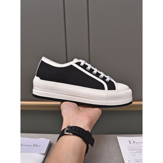 Dior Black Canvas Trainer Lateral View Side profile of Dior black canvas low-top trainer with white platform