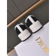 Dior Walk'n'dior Trainer Heel Detail in black Rear heel view of Dior Walk'n'dior trainers showing embossed brand name in black