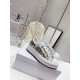 Dior Walk'n'dior Platform Trainers Pair Overview in cream and navy Pair of Dior Walk'n'dior Platform Embroidered Low-Top Trainers on white shoe box in cream and navy