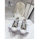 Dior Beige Floral Pattern Platform Trainers - Top Front View Frontal top-down view of Dior beige floral pattern lace-up platform trainers