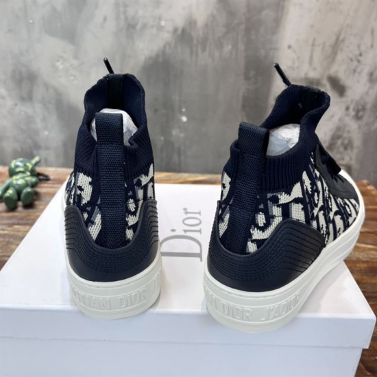 Rear view of Dior Walk'n'Dior high top trainers displaying navy leather heel panels in dark blue
