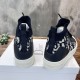 Rear view of Dior Walk'n'Dior high top trainers displaying navy leather heel panels in dark blue