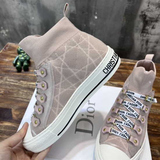 Angled view showing the inner side and sole detailing of Dior Walk'n'Dior high-top knit pink trainer