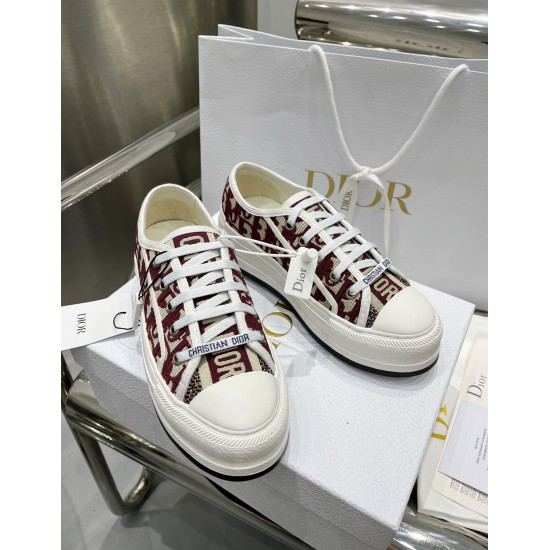 Front View of Dior Burgundy Oblique Trainers Front elevated view of Dior Walk'n'dior burgundy Oblique trainers showing laces