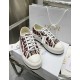 Front View of Dior Burgundy Oblique Trainers Front elevated view of Dior Walk'n'dior burgundy Oblique trainers showing laces