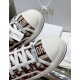 Dior Walk'n'dior Toe Cap Detail in burgundy Close-up of white rubber toe caps and branded laces on Dior burgundy trainers