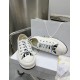 Dior Walk'n'dior White Canvas Trainers Front Angle Front elevated view of Dior Walk'n'dior white trainers resting on box