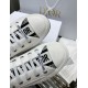 Dior Walk'n'dior White Trainer Toe Cap and Lace Detail Close-up detail of Dior Walk'n'dior white trainer toes and branded laces