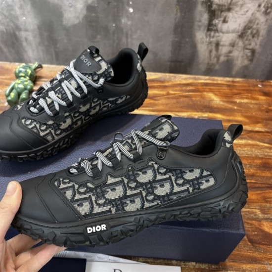 Dior Diorizon Low Top Oblique Jacquard Trainers Outer Profile in beige and black Side view highlighting the outer profile of Dior Diorizon Low Top Oblique Jacquard Trainers in beige and black