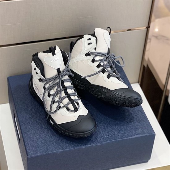 Front Angle View of Laced Hiking Boots in grey and black Front elevated view of grey hiking boots showing two-tone laced closure on box in grey and black