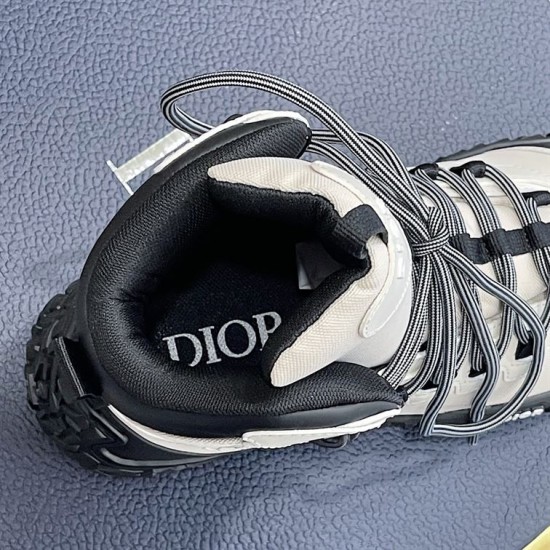 Interior Collar and Lining Detail in grey and black Close-up view of padded boot collar and black interior lining with brand name in grey and black