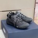 Dior Diorizon Black Hiking Shoes Pair View Pair of black Dior Diorizon technical mesh hiking shoes on a blue box
