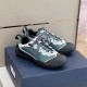 Pair of Dior Diorizon Technical Mesh Hiking Shoes in green grey sitting on shoe box