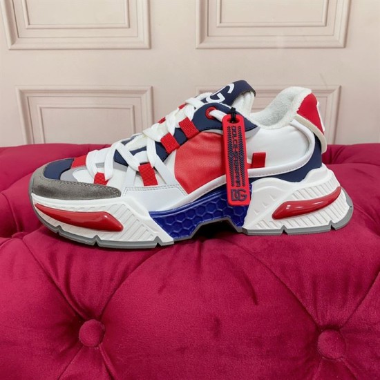 Dolce & Gabbana Airmaster Multicolour Low Top Trainer Lateral Profile in multicolour and white Lateral side profile of Dolce & Gabbana Airmaster Multicolour Low Top Trainer on red background in multicolour and white