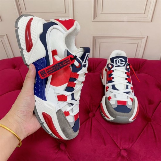 Dolce & Gabbana Airmaster Multicolour Low Top Trainer Handheld View in multicolour and white Hand holding single Dolce & Gabbana Airmaster Multicolour Low Top Trainer demonstrating side profile and sole in multicolour and white