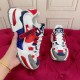 Dolce & Gabbana Airmaster Multicolour Low Top Trainer Handheld View in multicolour and white Hand holding single Dolce & Gabbana Airmaster Multicolour Low Top Trainer demonstrating side profile and sole in multicolour and white