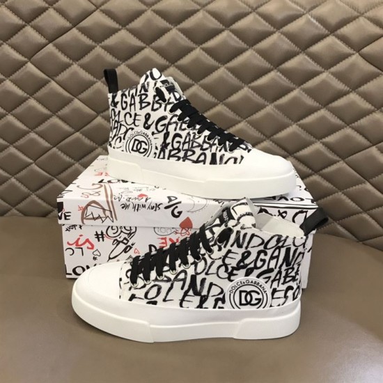 Pair of Dolce & Gabbana Portofino Light Canvas Logo Print Mid-Top Trainers presented with brand shoe box in white and black