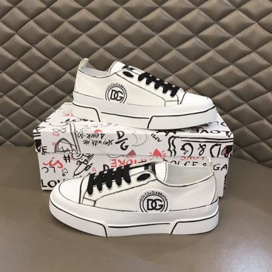 Pair of Dolce & Gabbana Portofino Light white trainers presented with branded shoe box in white and black