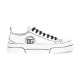 Profile shot of white Dolce & Gabbana Portofino Light hand-painted canvas trainer in white and black