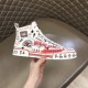 Dolce & Gabbana Graffiti Canvas Mid-Top Trainers Handheld Profile in white Dolce & Gabbana white hand-painted trainer held to highlight lateral side artwork and sole
