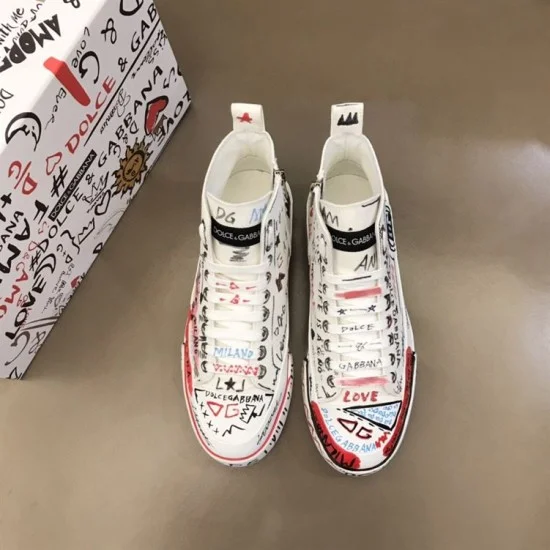 Dolce & Gabbana Graffiti Canvas Mid-Top Trainers Overhead Pair View in white Top-down view of both Dolce & Gabbana white graffiti canvas trainers showing laces and footbed