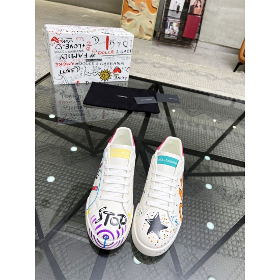 Top-down view of Dolce & Gabbana Portofino Graffiti Print White Leather Trainers showing toe boxes and laces in white and red