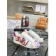 Pair of Dolce & Gabbana Portofino Graffiti Print White Leather Trainers on display in white and red