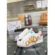Dolce & Gabbana Portofino Graffiti Print White Leather Trainers showing orange ONLY lettering in white and red